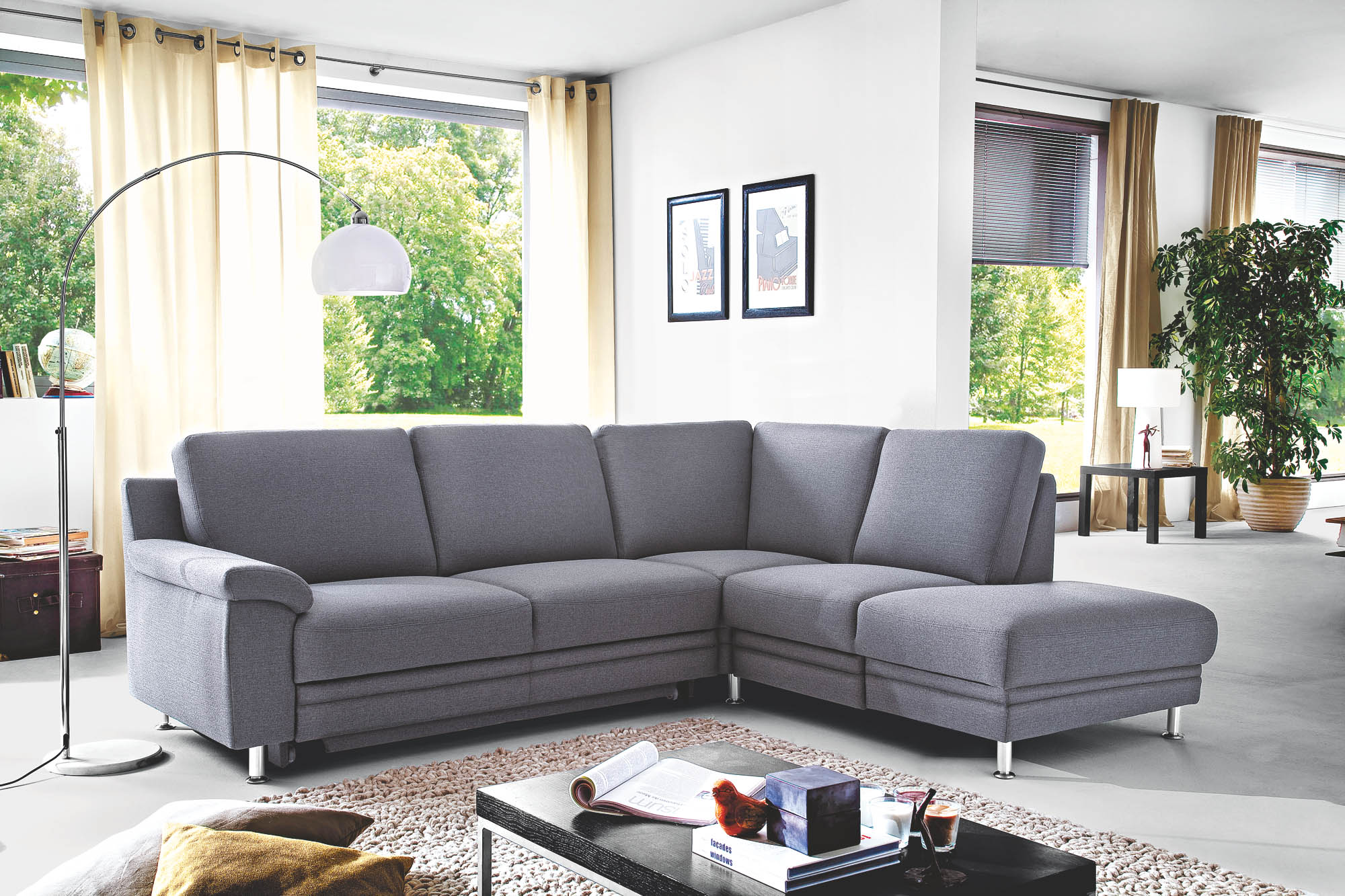 Ecksofa Comfortpolster Plus Amanda, optional mit Bett, Stauraumschublade und Kopfstützen.